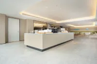 โรงแรม JI (สถานีรถไฟเล่อซาน)