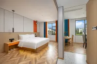 BAMBOO BOAT Hotel (Hongta District Yuxi No. 3 Middle School) Hotel dekat Gaogu Building