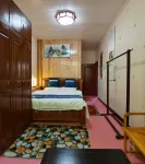 Cunyuan Thatched Cottage Inn Hotels in Bome