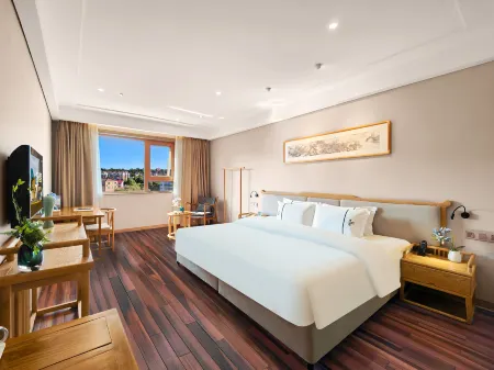 Man zhou Hotel Lilingmen Jinyang Branch Отели рядом с достопримечательностью «Zhuangyuanzhou Island»