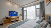 Jiuhua Mountain Yimi Nuanju Homestay (Jiuhua Mountain Tourist Service Center) - พร้อมระเบียง