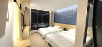 Xijiang Qianhu Miaozhai Longmen Theme Hotel