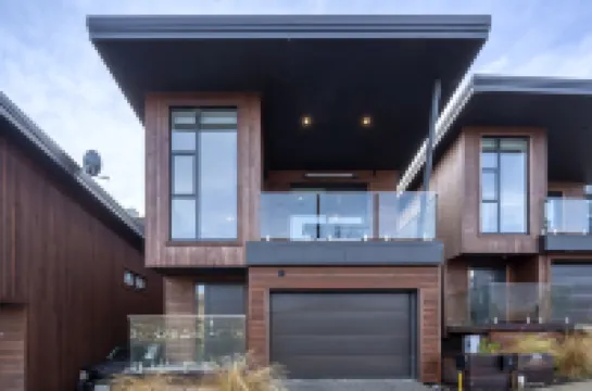 Stylish 2-BR Home, Scenic Balcony, Key Amenities โรงแรมใน