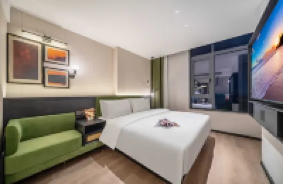 Sijiqing Teng Hotel (Ningbo Jiangshan Wanda Plaza Branch) โรงแรมใกล้ถนนหมิงฮุย