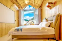 Xiaohuajiang Buyi Qiaoyuan Homestay - เปิดใหม่