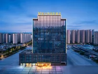 Vienna International Hotel(Zhoukou Wanguo Car World Store)