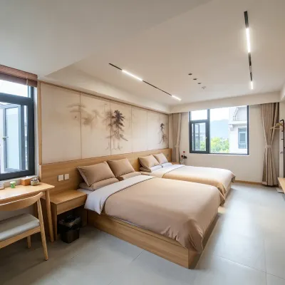 Xianju Jingmu Nuanyang B&B (Shenxianju Visitor Center Branch) Hotels near Xianju White Pagoda Artificial Lake
