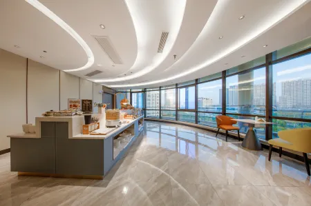 Elong Anyun Hotel (Zhangjiagang Passenger Station) Отели рядом с достопримечательностью «Yangshelao Street»