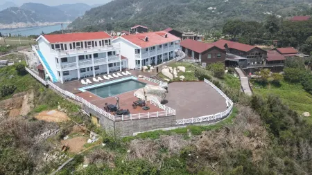 NanJiDaoSanPanMinSu Отели рядом с достопримечательностью «Sanpanwei»