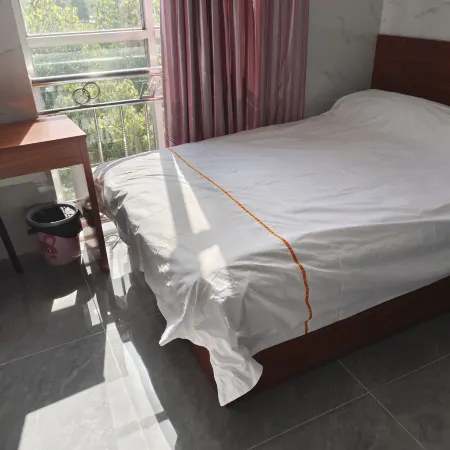 Xinxian Huixin Supermarket Business Hotel Hotels in Xin County