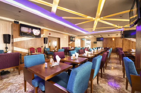 فندق أمواج الدولي تناول الطعام Photos