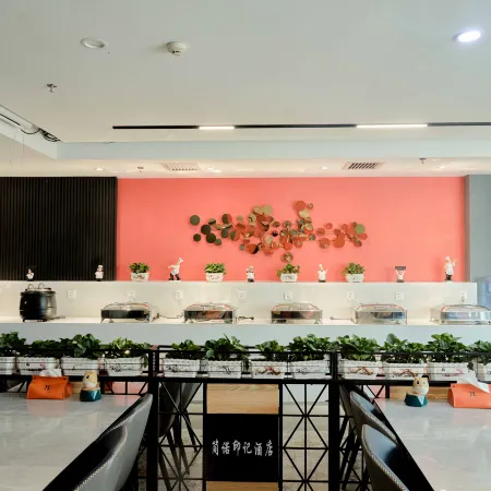 Korla Jianuo Imprint Hotel (Huijia Times Square)