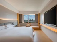Chengdu Xinghe Hotel (Honggao Road Metro Xihua University Branch) Hotels near Pidu District