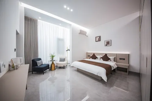 Meizhou Island Luming Lodge Light Luxury Vacation Homestay (Lianchi Ao Beach) - ที่มีบาร์