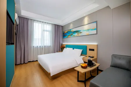 Tuke Chengshe Hotel (Gongyi Railway Station Xingyue Times Square Branch) Отели рядом с достопримечательностью «Kang Bai Wan Zhuang Yuan»