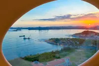 Yuli, the designer of Yushe, is amazed by the tranquil sea view homestay