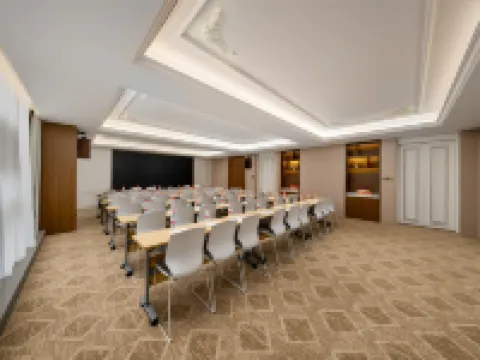 Vienna International Hotel (Heze Shan Development Zone Shunshi Building)
