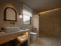 Yueqi Bay Homestay (Wanning Riyue Bay) 완닝 호텔