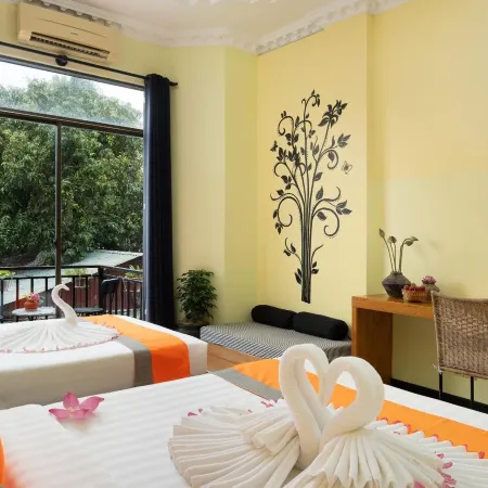 Central Indochine d'Angkor Hotel Отели рядом с достопримечательностью «Псар Чаас (Старый Рынок)»