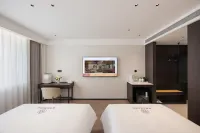 Yun Nan She Holiday Hotel (Qiqiqiao Shiqiao Market Branch, Jinzhou Railway Station) - Ramah keluarga
