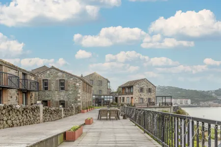 Qiheng Shishe Hotel Отели рядом с достопримечательностью «Wenling Shitang Peninsula Tourist Resort»