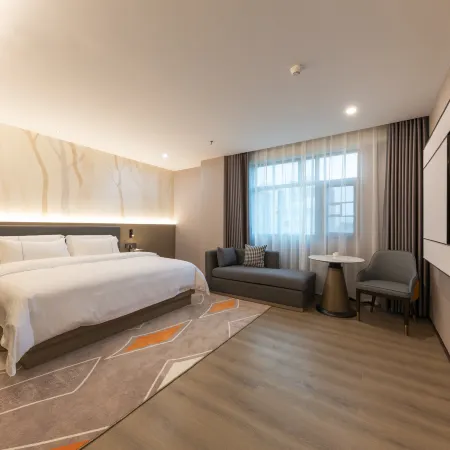 Aiqinhai Holiday Hotel Отели рядом с достопримечательностью «Железнодорожная станция Чанпин»