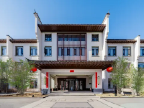 Jinghong Tianqing Hotel (Yijin Holo City Government Shop)