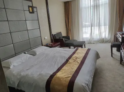Nanzhang Longxin Hotel Отели рядом с достопримечательностью «Южный Тулунг»
