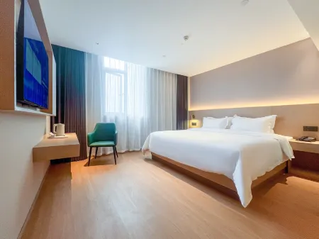 Sanhe Hotel (Wanda Plaza) Отели рядом с достопримечательностью «Shangrao Botanical Garden»