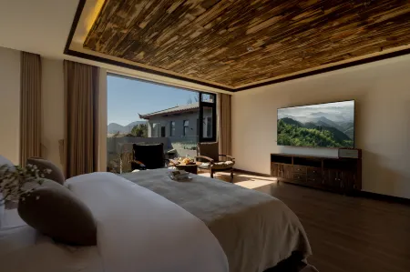 Mushan Snow Cottage Twilight Peaks • View Guanshan Shejing Linshu (Yulong Snow Mountain Branch) Отели рядом с достопримечательностью «Yuzhu Qingtian Scenic Resort»