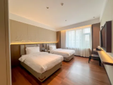 五常鑫悦臻品酒店（南廣場店） 鄰近五常市建設大街步行街的酒店