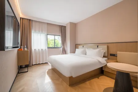 Shanghai Yiheju | Relaxed· Pleasant Designer Hotel (Jiading West Subway Station) Отели рядом с достопримечательностью «Shanghai Open University Jiading Branch»