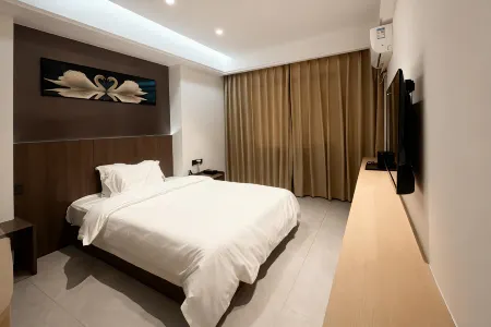 Qijian Apartment (Pingxiang North Station Olympic Sports Center) Отели рядом со станцией Pingxiang North Railway Station