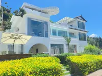 Dali Nanfeng Yiyu Seaview Hotel Santorini Hoteles en Zona escénica de península Luoquan