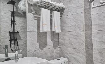 Yudu Zhanqian Business Hotel (Baicheng Railway Station)