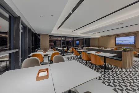 Echarm Hotel (Nantong Wanda Longxin Guangchang) Отели рядом с достопримечательностью «Nantong Confucious Temple»