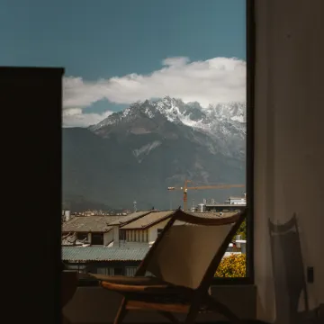 Nazhu Sky Courtyard Designer Snow Mountain View Homestay (Lijiang City Rizhao Jinshan Branch) Отели рядом с достопримечательностью «Улица Сыфан»