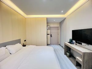 Cosy Yiju Hotel (Zhengzhou Erqi Square David City)