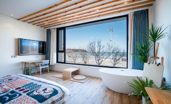 Weihai Cat Forest · Qiushui Homestay (International Coastal Baths Shandong University)
