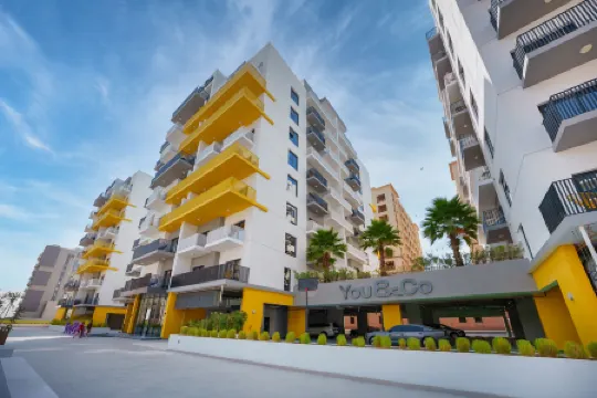 Apart-Hotel You&Co Dubai Отели рядом с достопримечательностью «Дубай Спортс Сити»