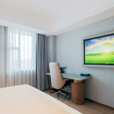 LANOU Hotel (Huangshi Yingbin Avenue Huahu Railway Station) Отели в г. Хуанши