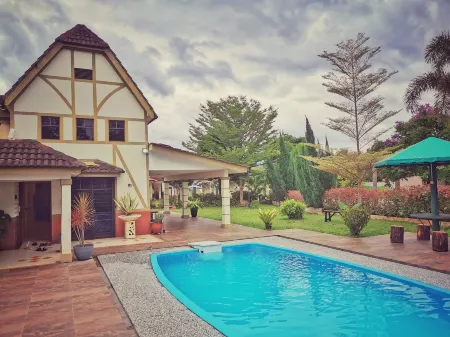 Yussy Homestay at Afamosa Villa Отели в г. Pegoh