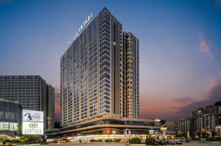 Boton International Hotel (Heyuan Jianji Shopping Center) Отели рядом с достопримечательностью «First High-Altitude Fountain in Asia»