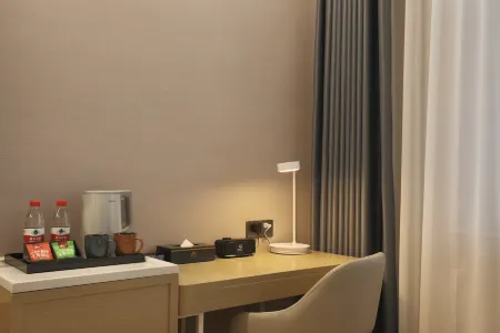 Aifeel Hotel (Tangshan Qian'an Shougang Mining Binhe Avenue) Отели в г. Цянань