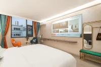 Hejing Film and Television Hotel (Mengzi Wencui Road Min'an Road Branch)