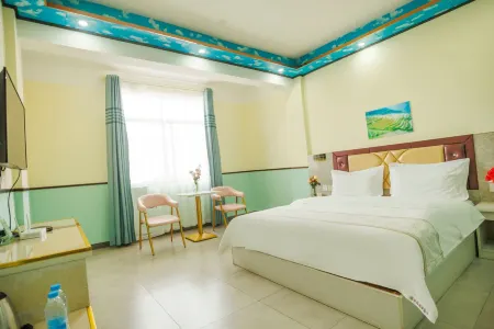 Green Spring Terrace Travel Hotel Отели в г. Lvchun