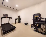 Guoshi Hotel (Dalian Donggang Business District Harbour Plaza Subway Station) - gimnasio