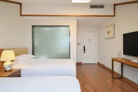 Xiehou Garden Hotel (Laoshan Scenic Area Liuqinghe Beach Branch) Отели рядом с достопримечательностью «Laoshan Taiqing Palace»