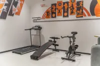Hexie Holiday Hotel (Guogou Plaza) - Gym