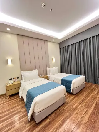Bravo Tanauan Hotel Отели в г. Танон